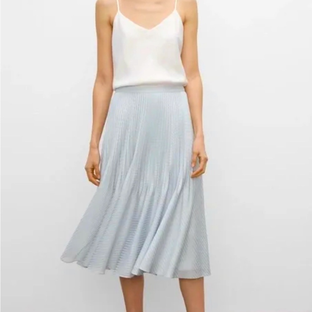 Club Monaco Light blue skirt ( new unopened in its package)